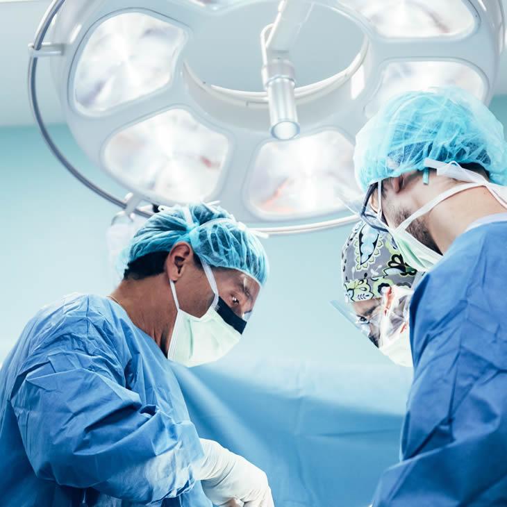 doctors working on patient