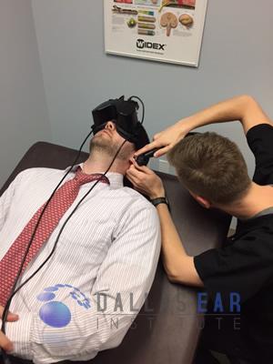 Videonystagmography doctor checking ear